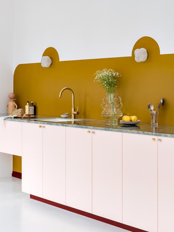 Rose Calcaire and Ocre kitchen by Margaux Keller