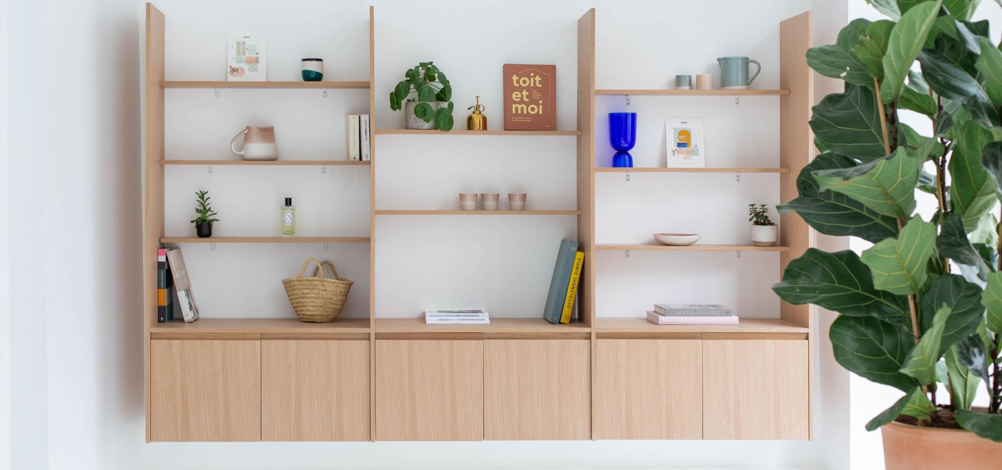 Floating bookcase in natural oak